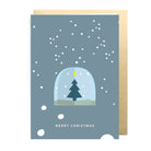 Christmas card with a snowy tree design on a blue background