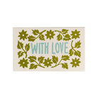 Decorative mat with green floral patterns and 'WITH LOVE' text on a white background