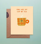 Greeting card with a cup of tea illustration and 'You are my cup of tea' text on a light blue background.