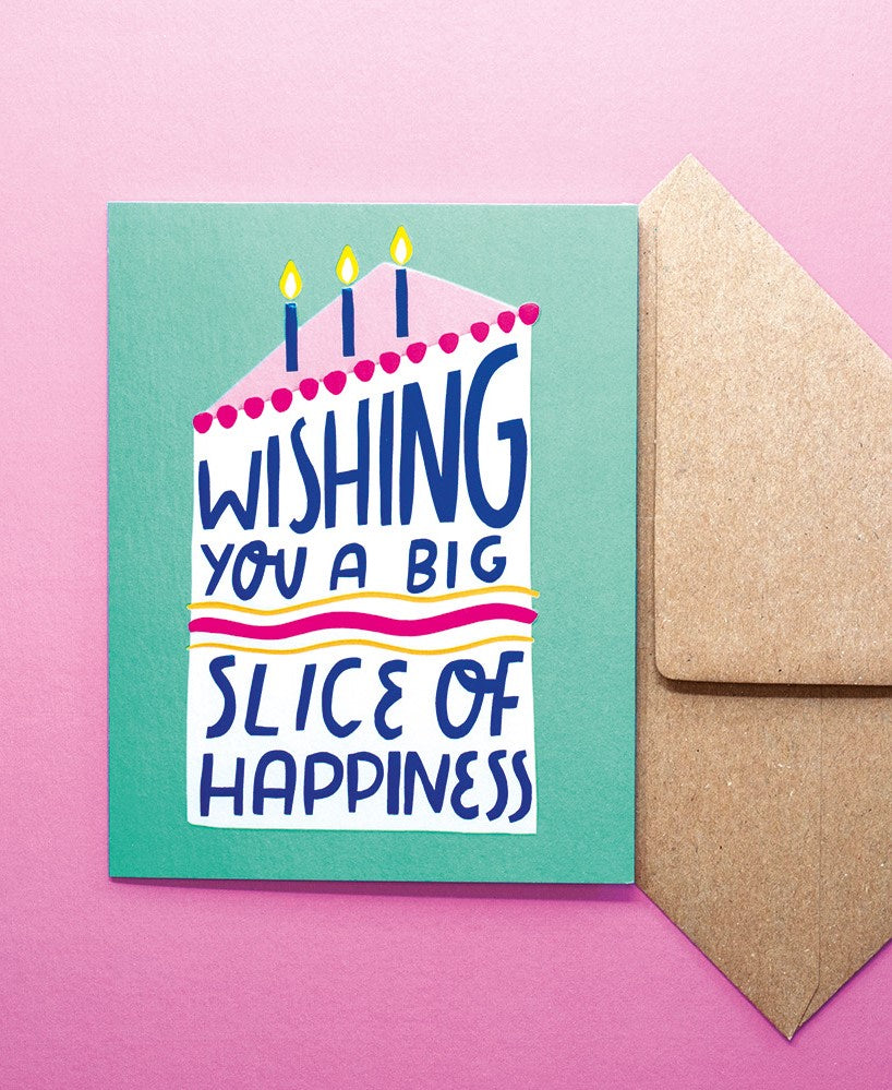 Greeting card with 'Wishing you a big slice of happiness' text and candles on a pink background