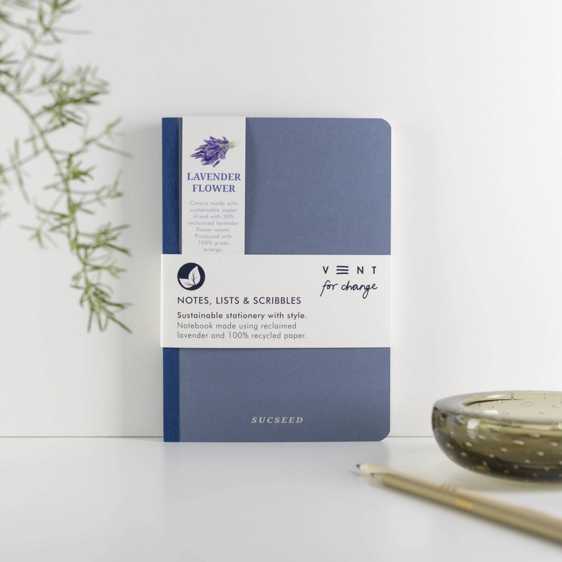 Blue notebook with lavender flower design on a white background