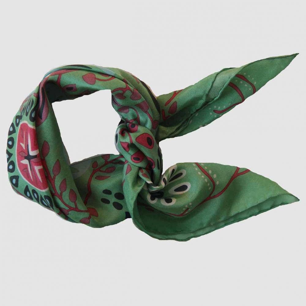 Green patterned scarf on a white background