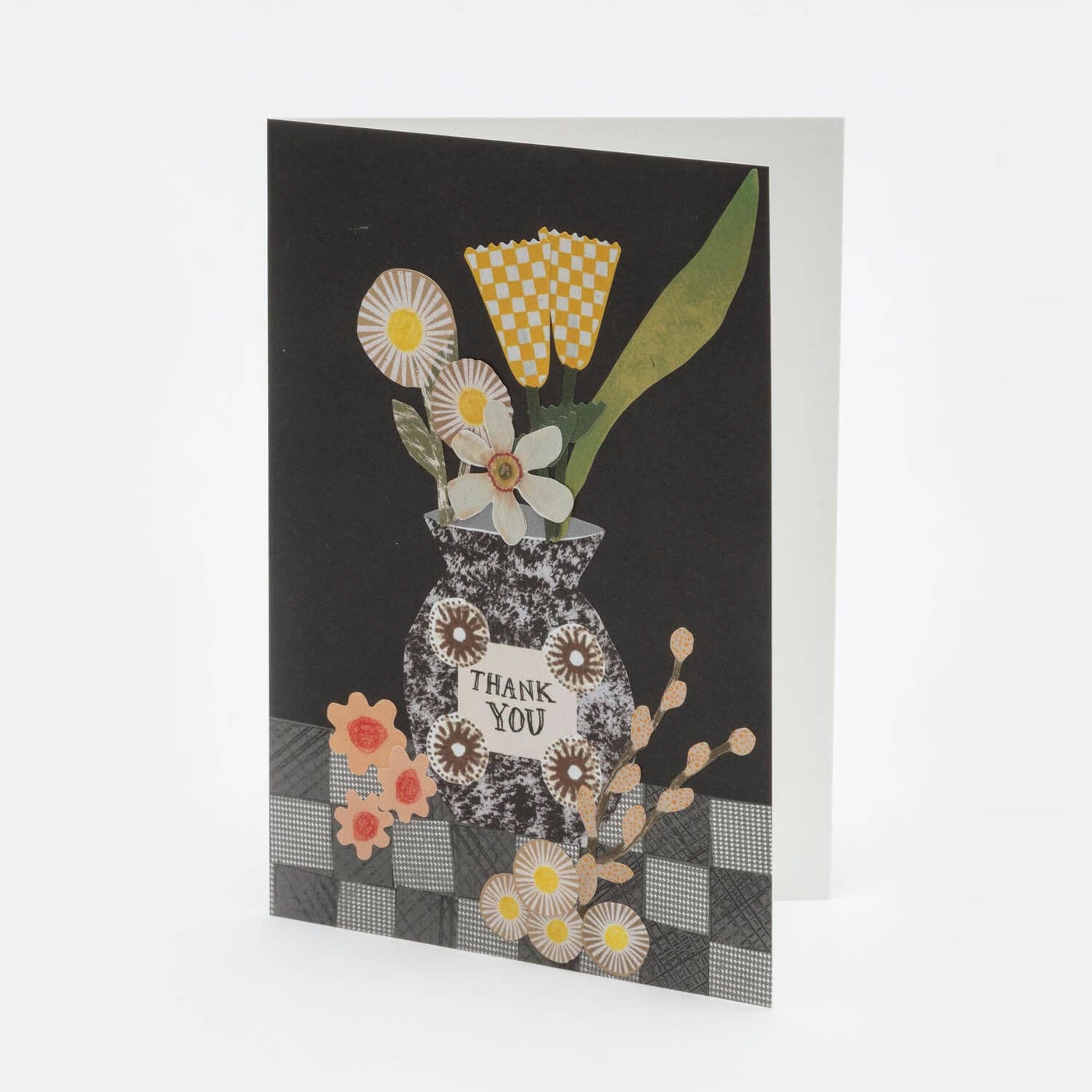 Greeting card with floral design and 'Thank You' text on a black background