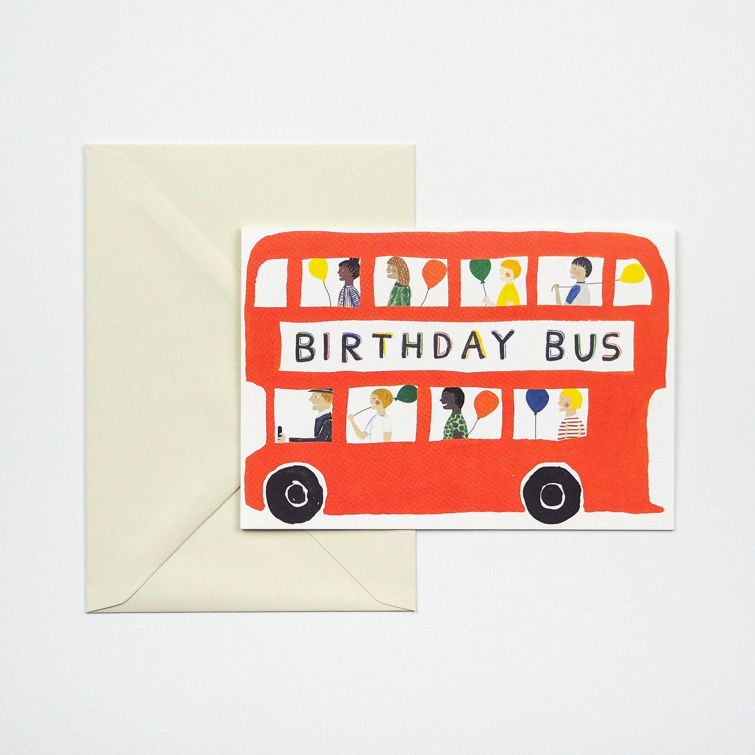 Greeting card with a red 'Birthday Bus' design on a white background