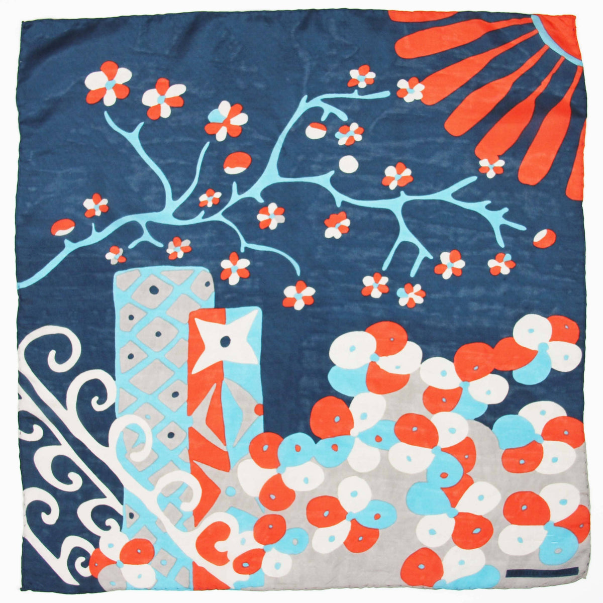 Colorful patterned fabric with floral and abstract designs on a blue background