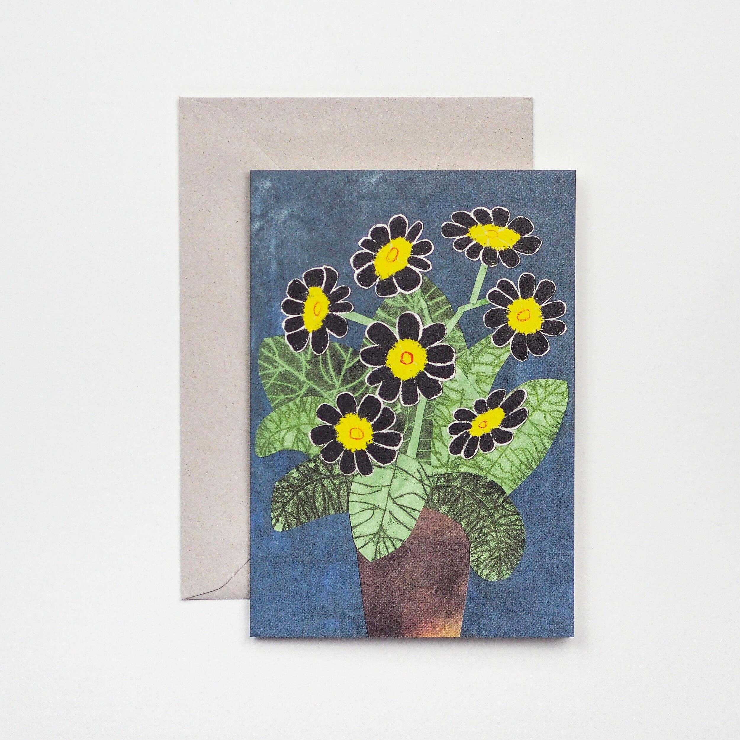 Greeting card with floral design on a blue background