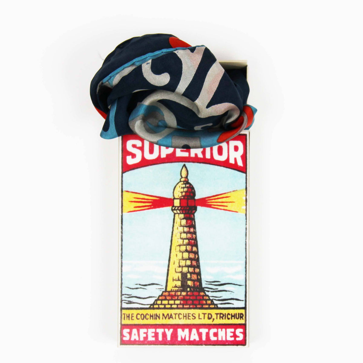 Matchbox with a colorful matchstick on a white background