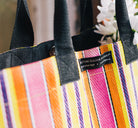 Colourful recycled market bag in pink, green and yellow tones, made from repurposed cement sacks