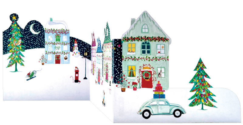 Christmas-themed village scene with houses, trees, and a car on a white background