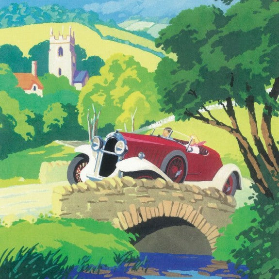 Greetings card featuring artwork of a red classic car driving through a sunny countryside scene,