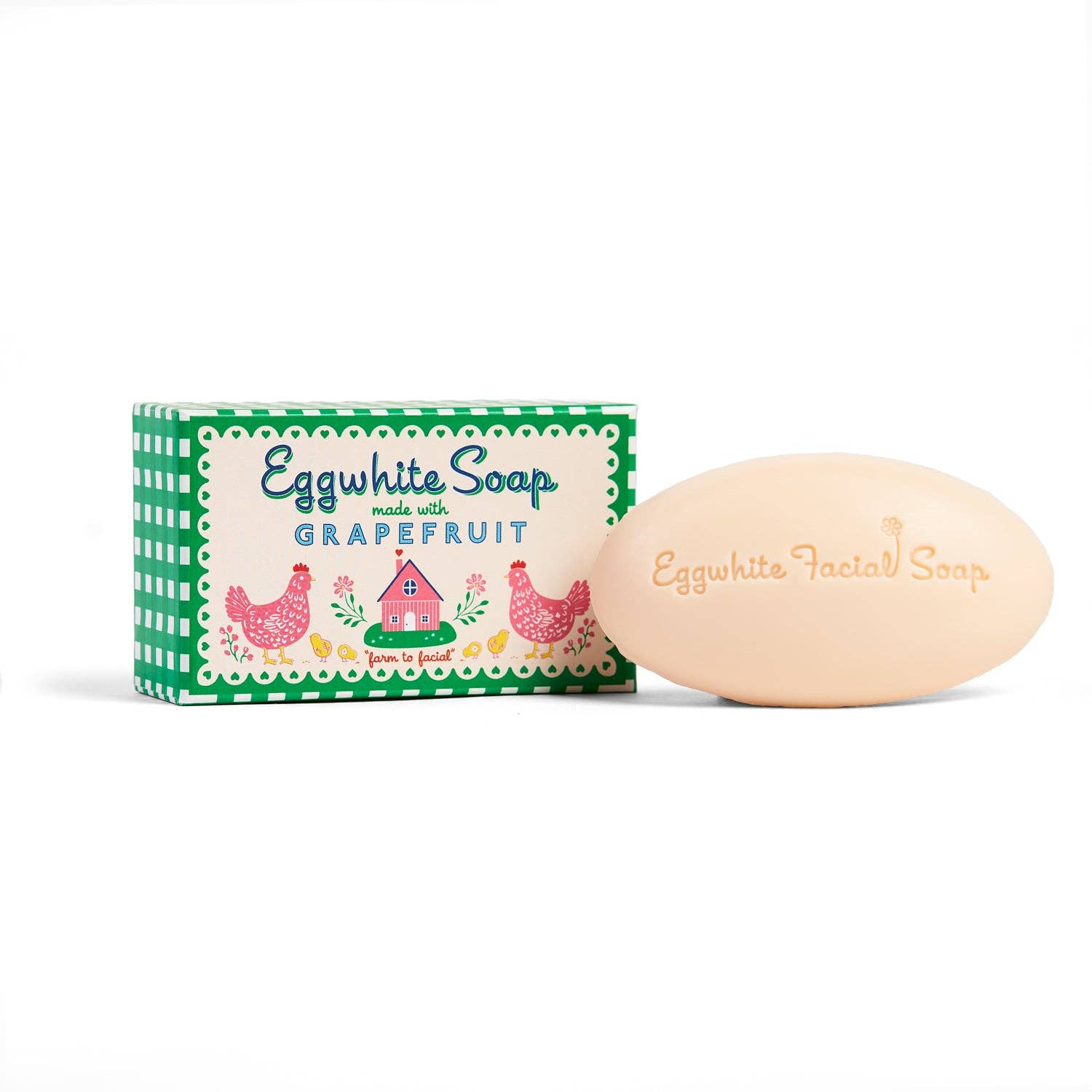 Eggwhite soap bar with green packaging on a white background