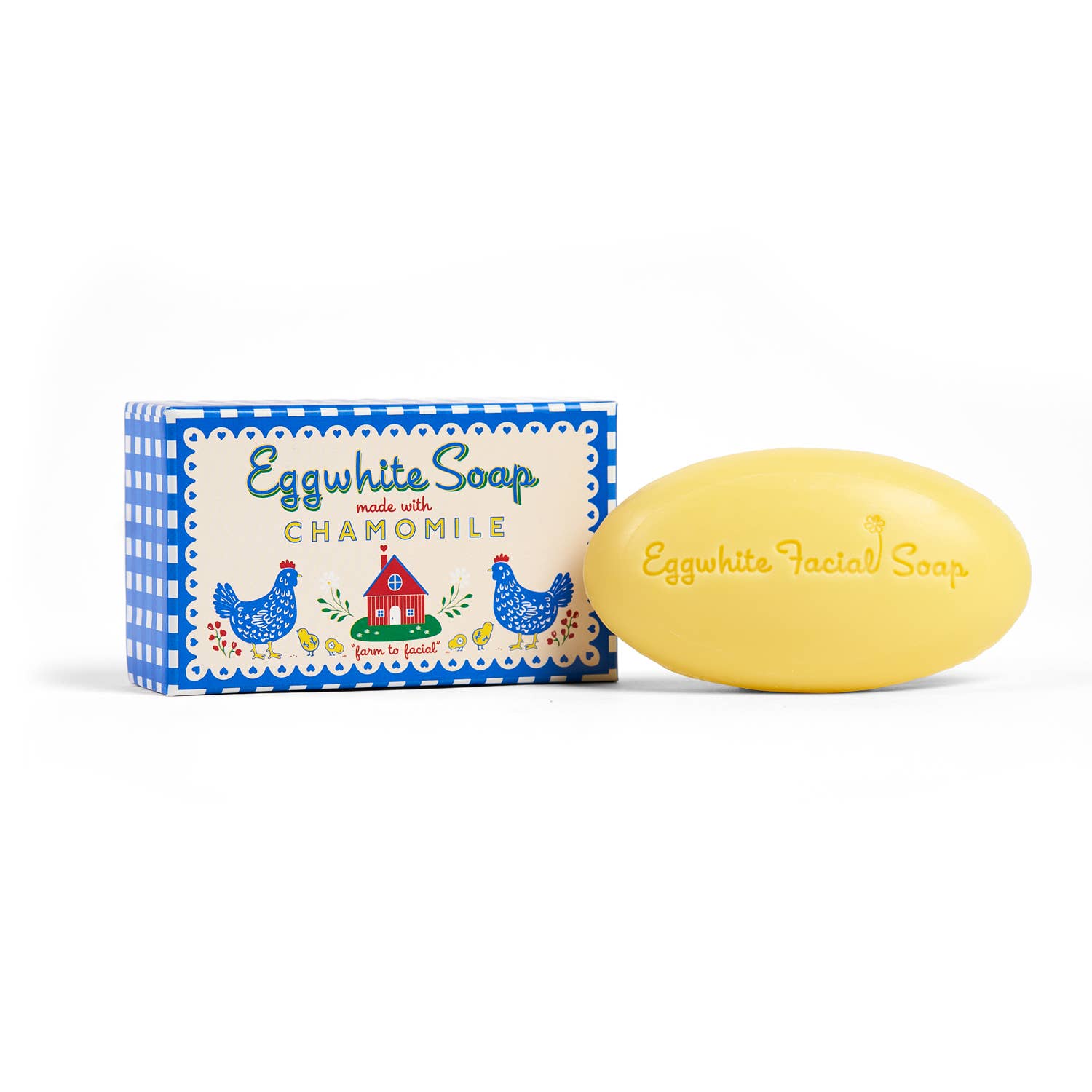 Eggwhite Soap with chamomile next to its packaging on a white background