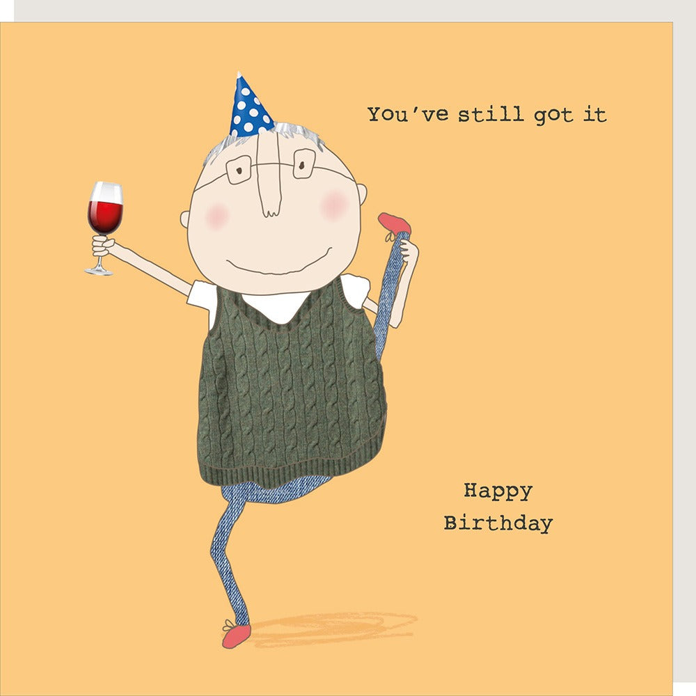 Cartoon character with a birthday hat, glass of wine, and lollipop on an orange background with 'Happy Birthday' text.