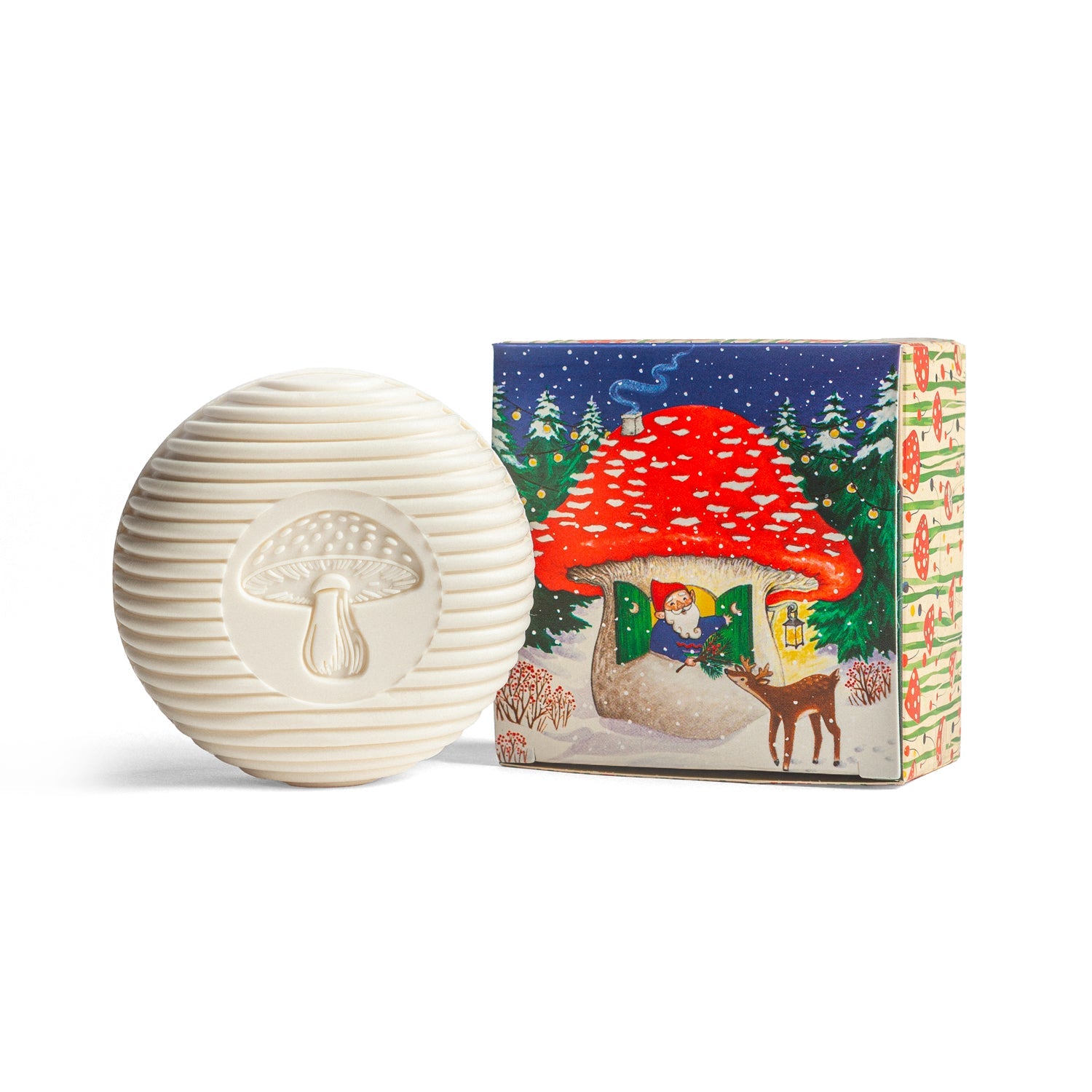 White textured mushroom-shaped object next to a colorful box with a forest design