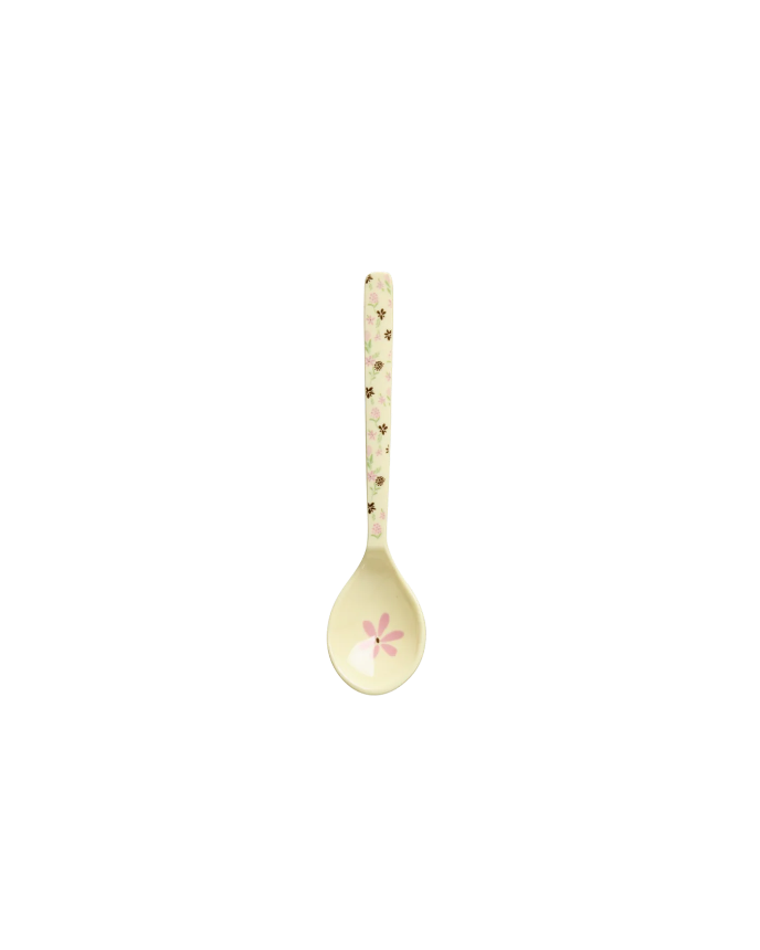 Decorative spoon with a floral design on a white background