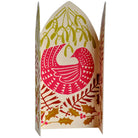 Decorative box with a bird design and holly leaves on a white background