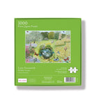 Jigsaw puzzle box with a garden scene on a green background