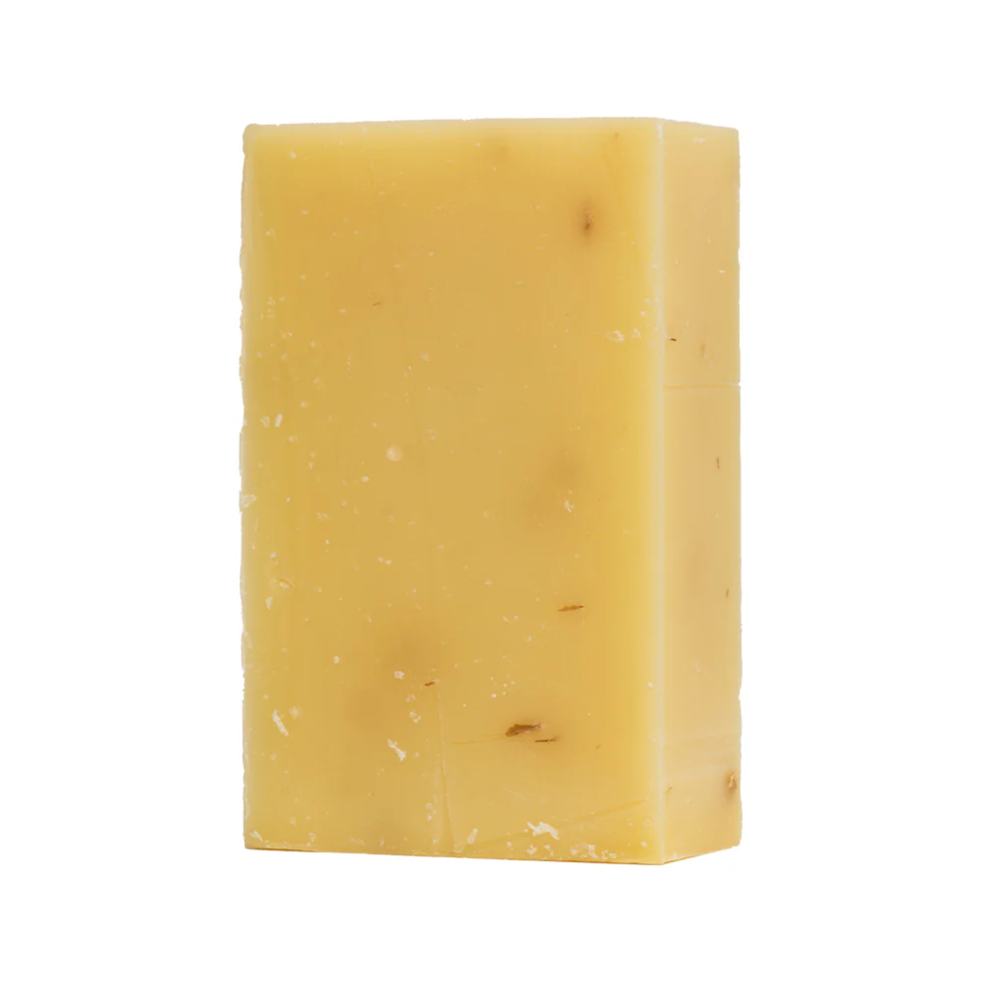Yellow bar of soap on a white background