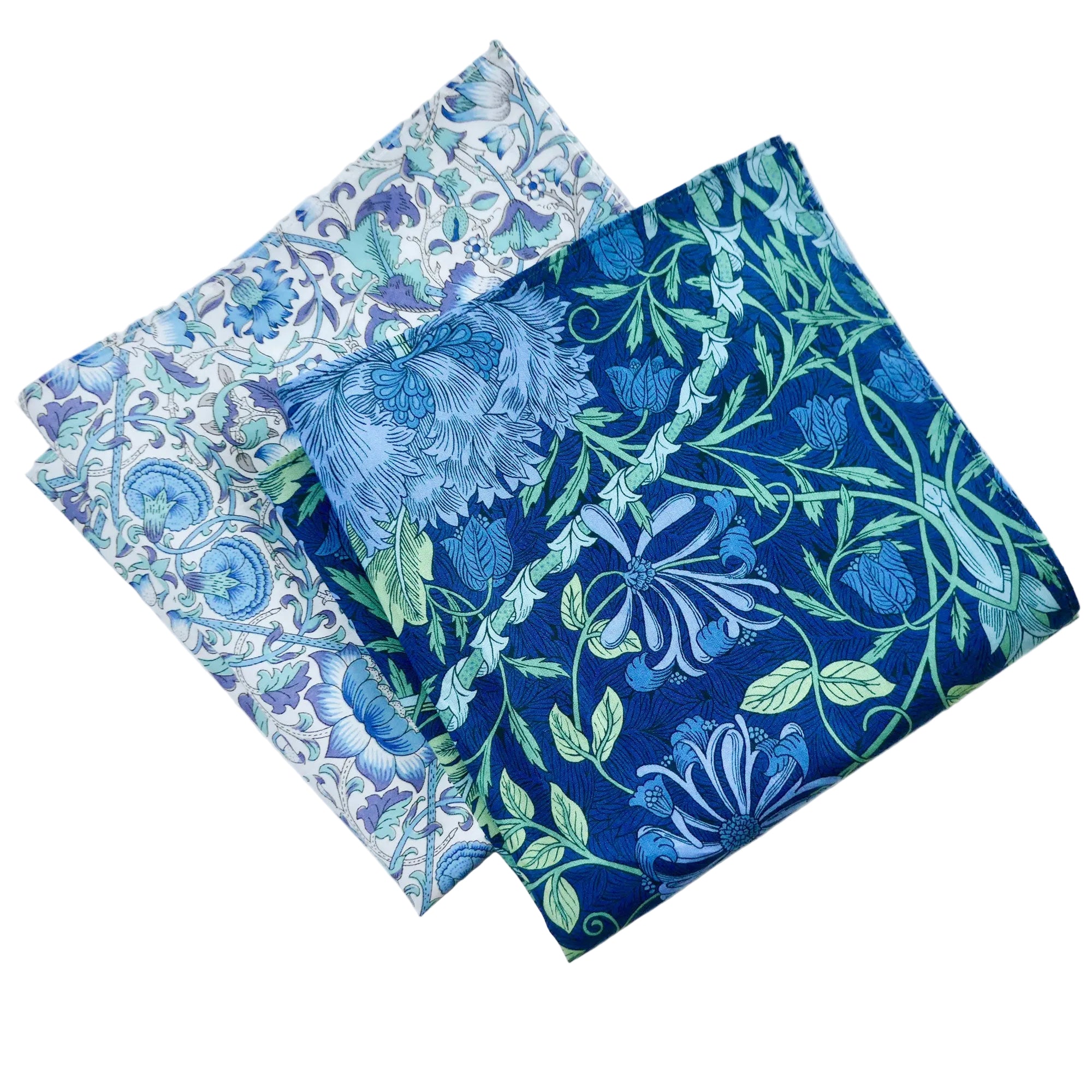 Two floral-patterned fabric hankies on a white background