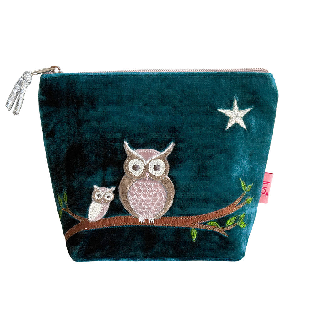 A dark teal velvet zippered pouch featuring embroidered owls on a branch with a white star, shown on a plain white background.