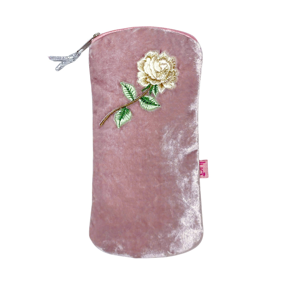Pink velvet pouch with embroidered white rose on a white background