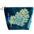 Blue pouch with a peacock design on a white background