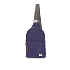 Navy blue sling bag with a strap on a white background