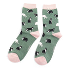 Green socks with black and white cat pattern on a white background