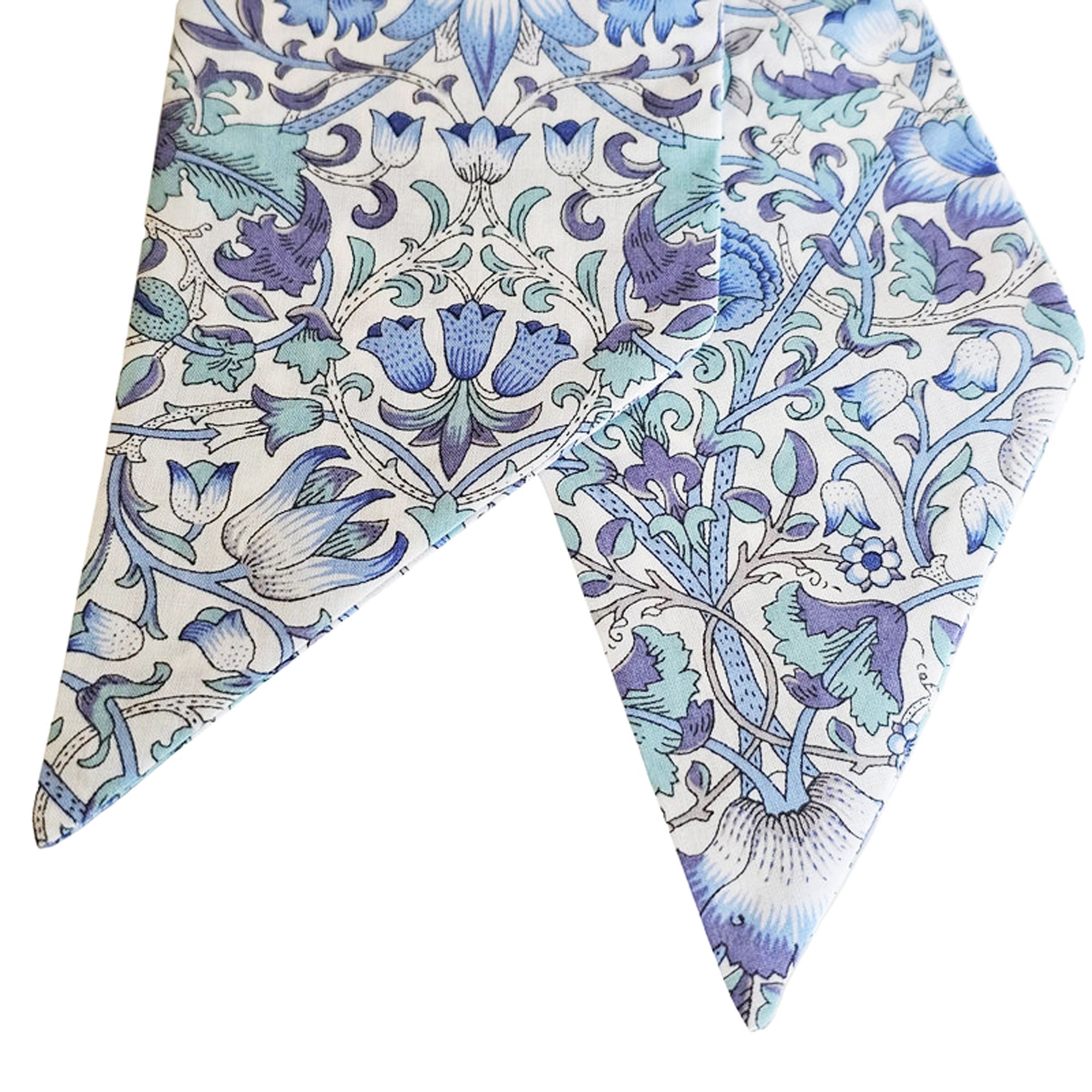 Floral patterned fabric scarf on a white background
