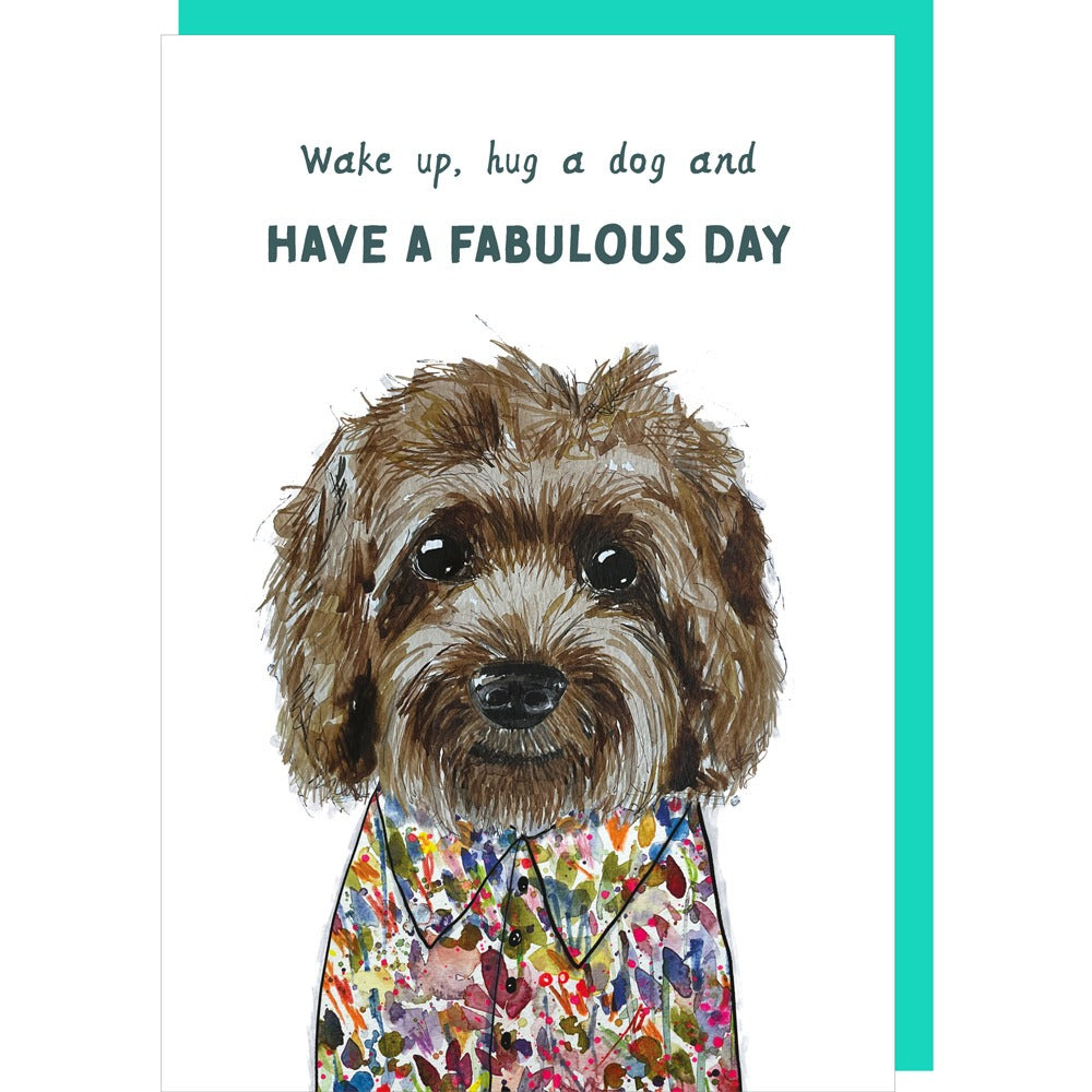 Card with a dog illustration and text 'Wake up, hug a dog and HAVE A FABULOUS DAY' on a white background.