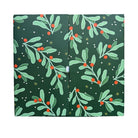 A green advent calendar with a Christmas-themed pattern of holly and berries, featuring gold and silver vermeil accents.