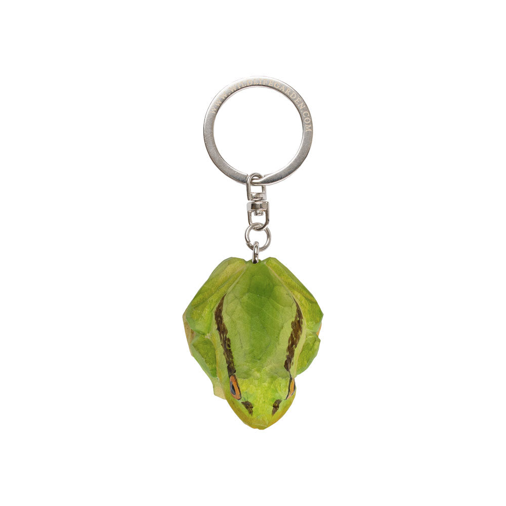 Keychain with a green stone-like object on a white background