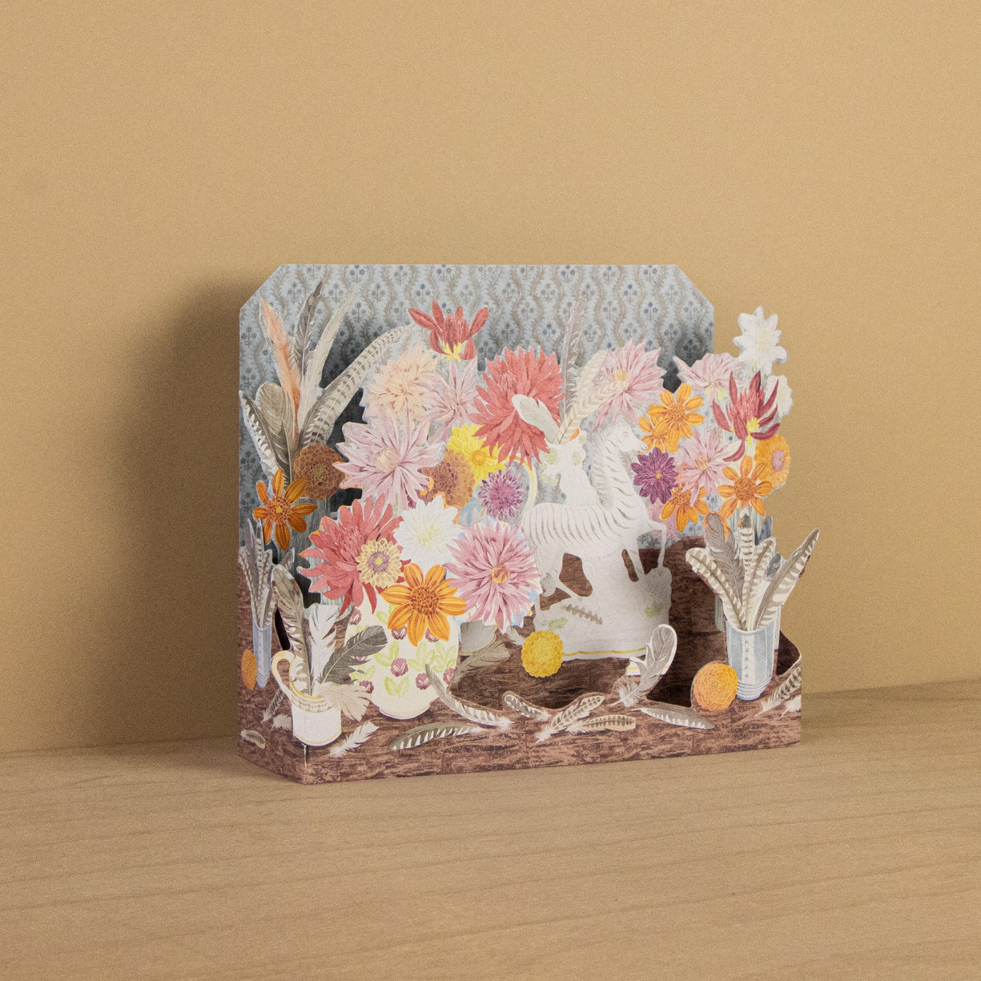 3D floral card with a zebra design on a wooden surface and beige background