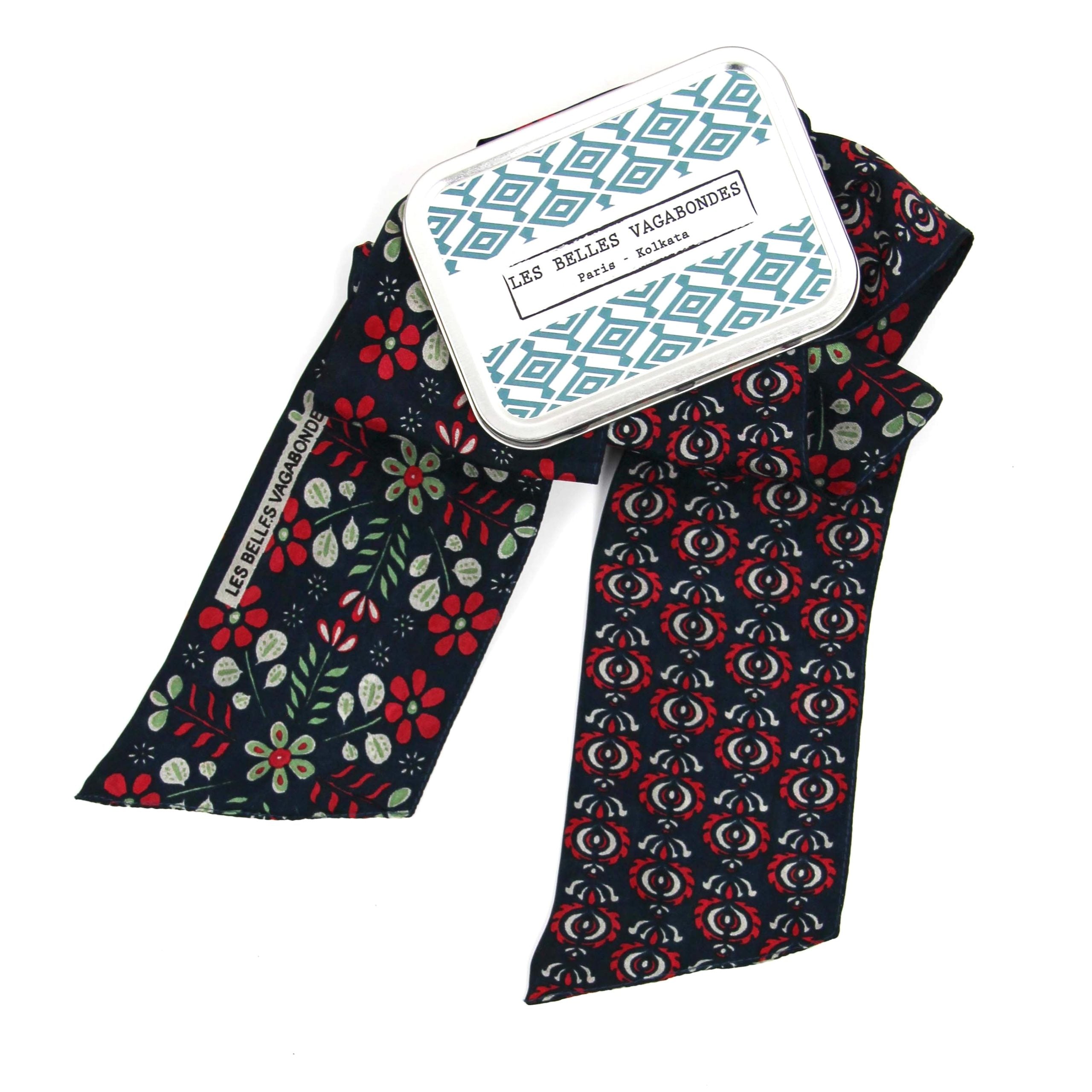 Scarf with floral and geometric patterns on a white background