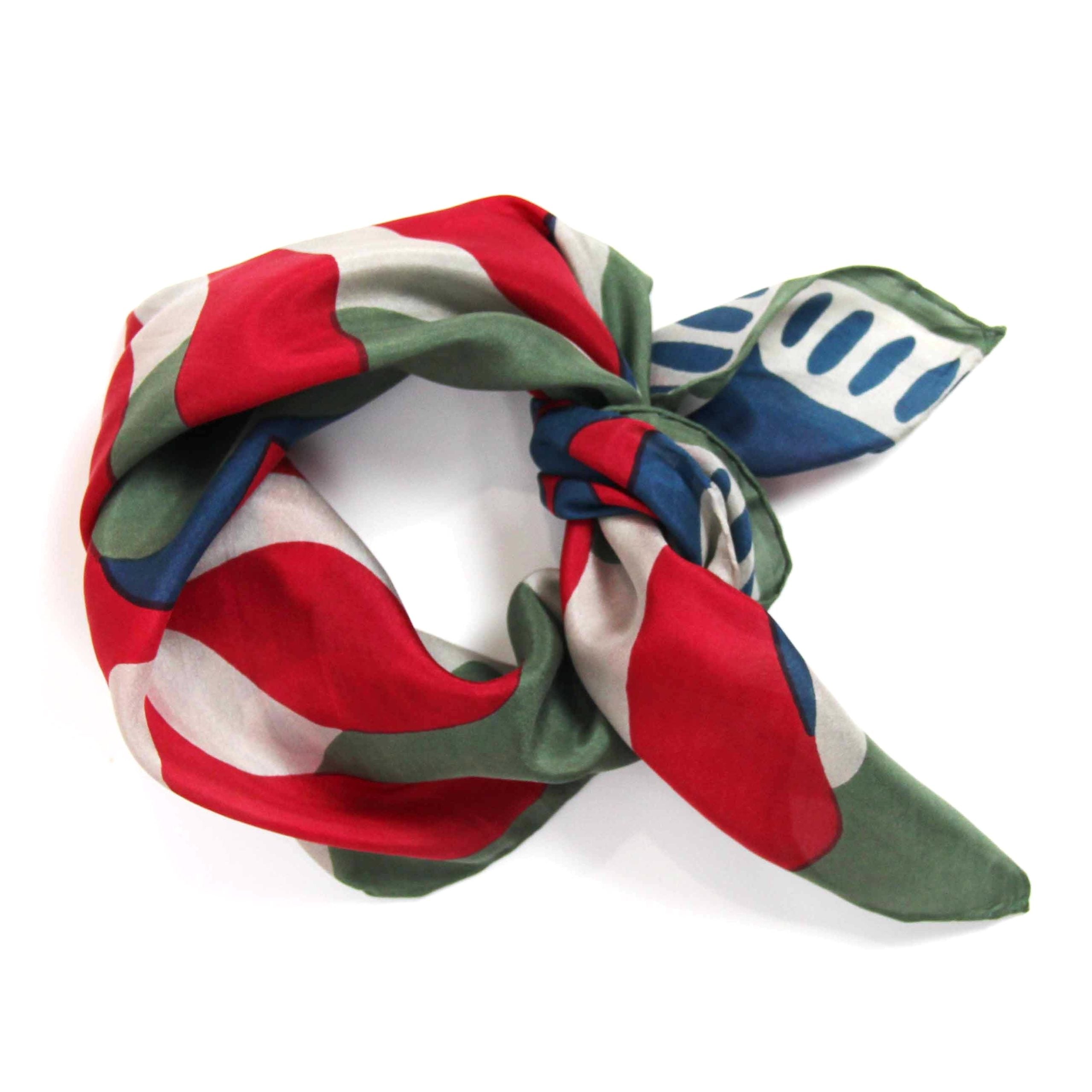 Colorful scarf with red, green, and blue patterns on a white background