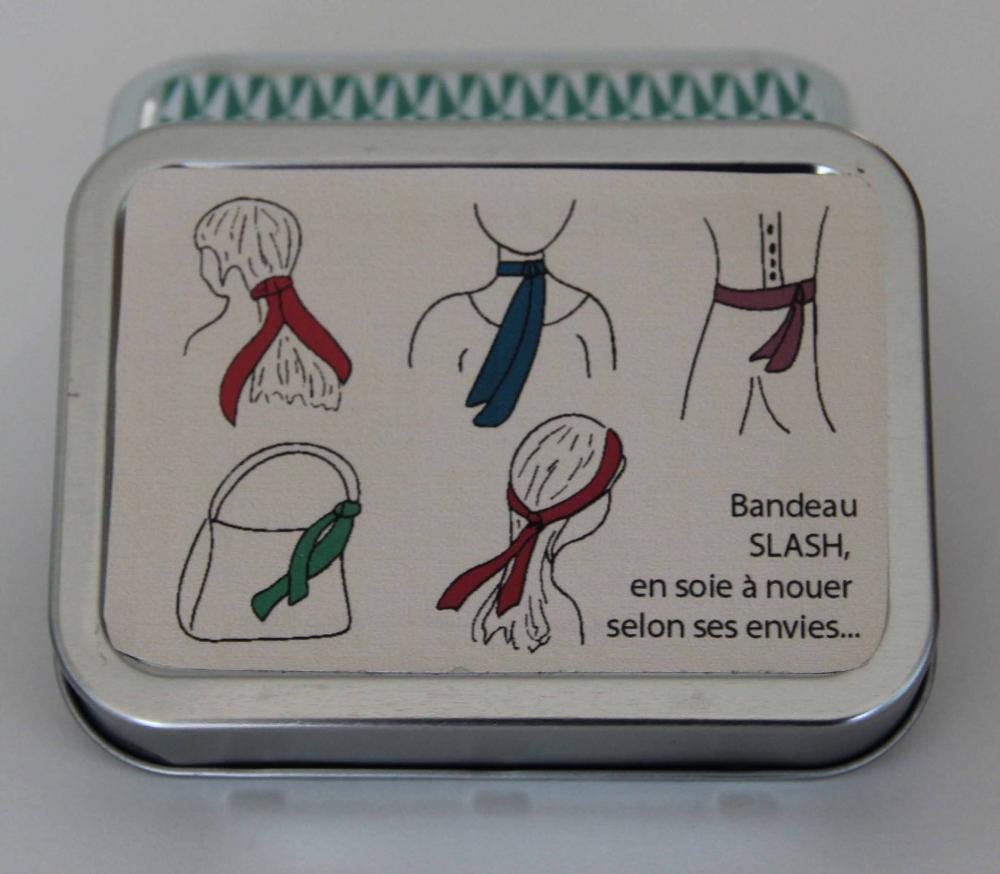 Metal tin with illustrations of scarves and bandages on a white background