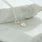 tiny mouse pendant close up