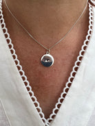 tiny heart cut out medallion