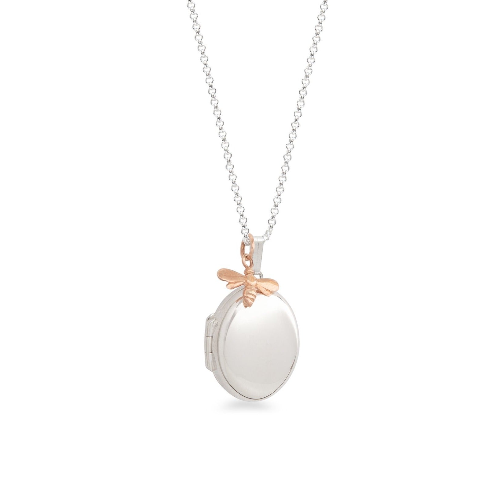 silver oval locket with gold bee