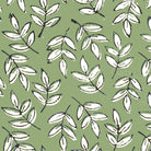 block print fabric close up of green leaf design