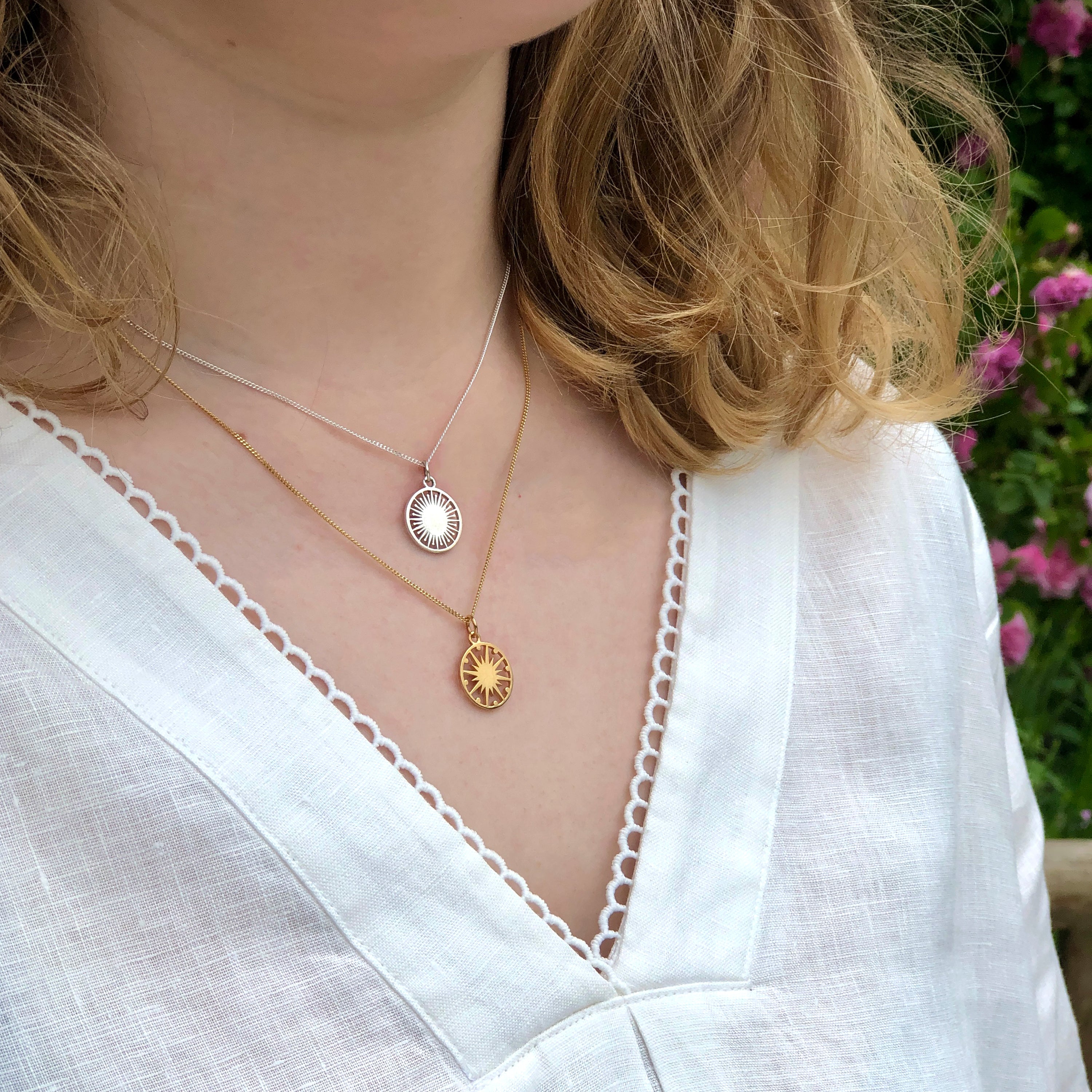 layering necklaces supernova and star