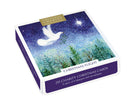 Box of Christmas charity cards with a dove and star design on a white background