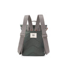 Back view of a green backpack with grey straps on a white background showing padded back and adjustable straps