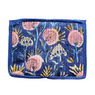 Floral patterned pouch with pink flowers on a blue background