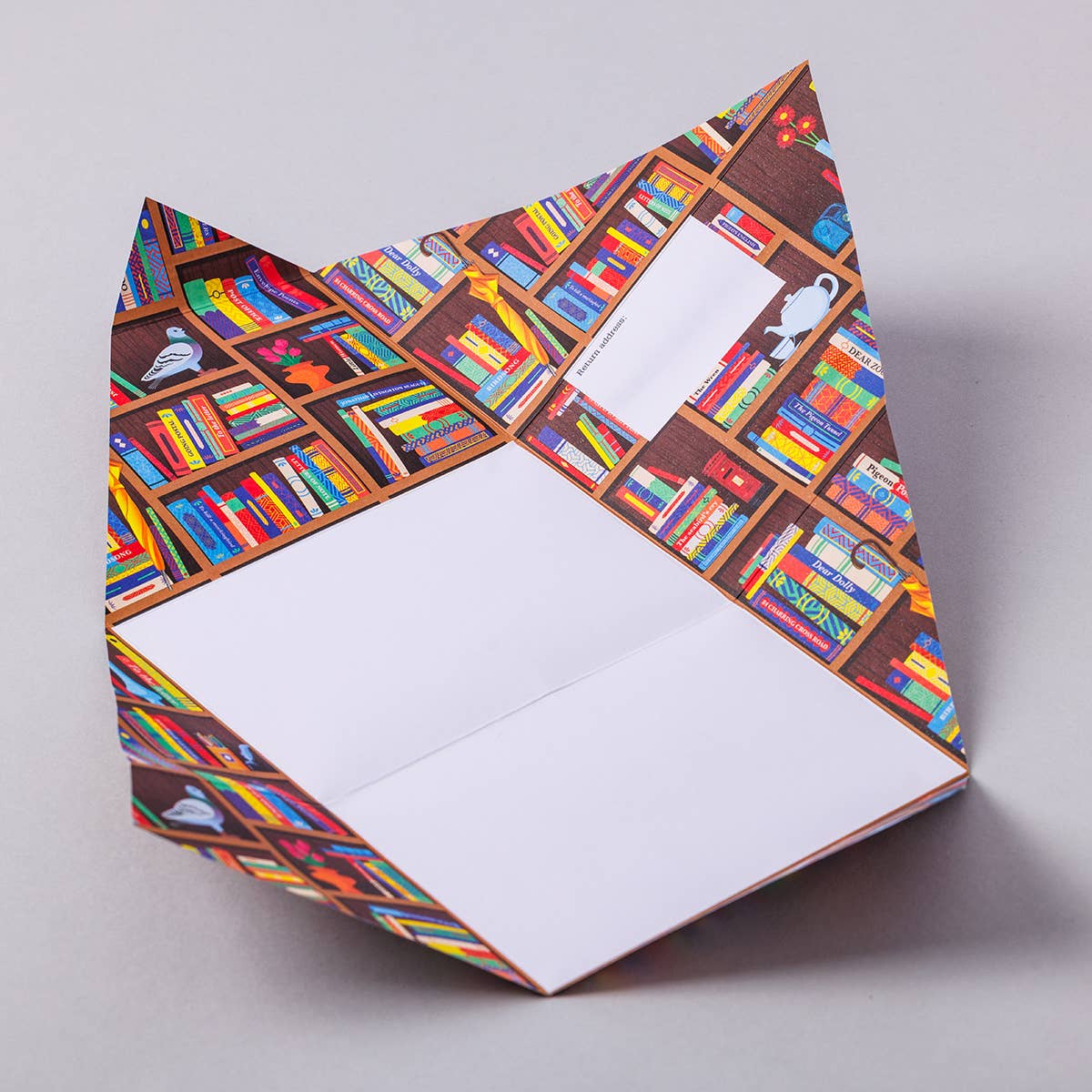 Letter set with a colourful bookshelf design 