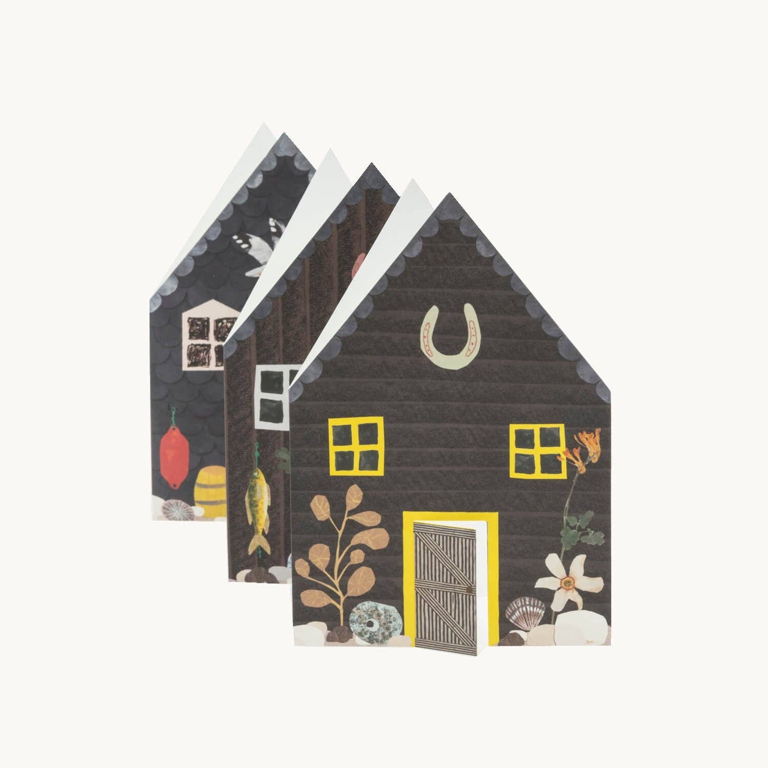 Detail of concertina folded on fishermen house-shaped cards with illustrations on a white background