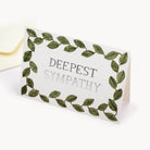 Card with 'Deepest Sympathy' text and leaf design on a white background