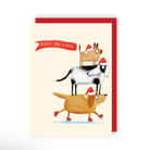 Christmas card with an illustration of three dogs in a stack from, standing on each other’s backs with the smallest at the top and the bottom one wearing ice skates. All the dogs are wearing Santa style red hats with white trim. The smallest dog has a red banner flying from it’s tail which reads Merry Christmas in capitalised white text. 