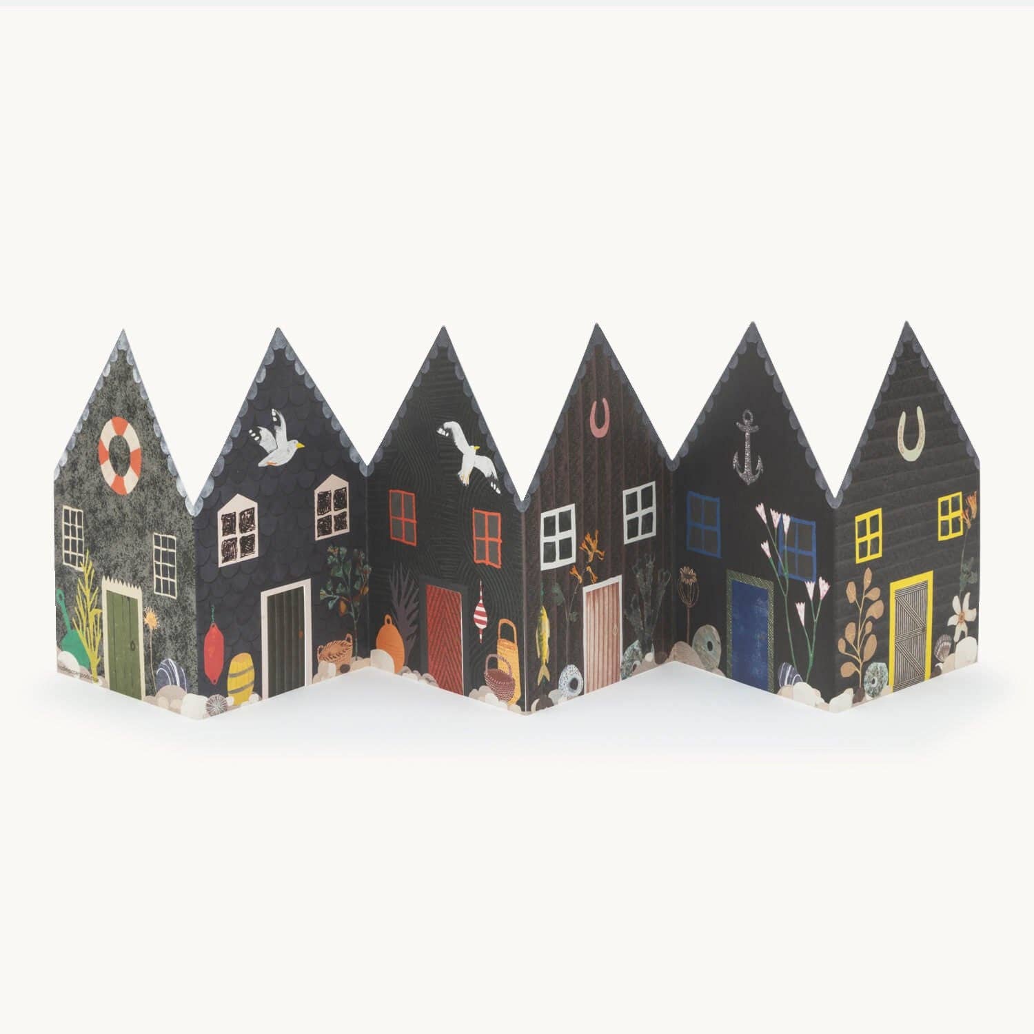 Greetings card of decorative paper houses with various designs on a white background