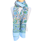 Scarf with floral and patterned design on a white background